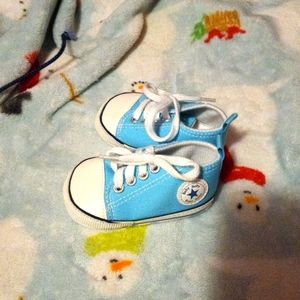 Baby Baby converse looks like girls shoe.   Box 293.  7/23